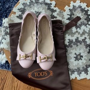 Brand new Tod’s flats, NWOT, with their original dust bag and box.